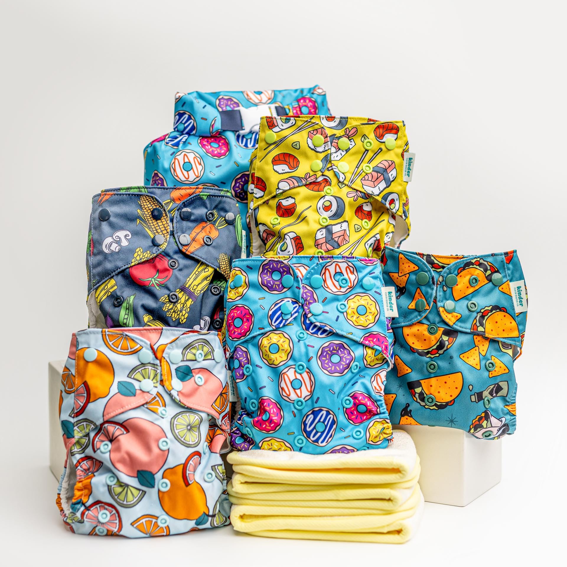 Kinder Foodie pocket diaper front view shows adjustable rise for newborn to potty-training use