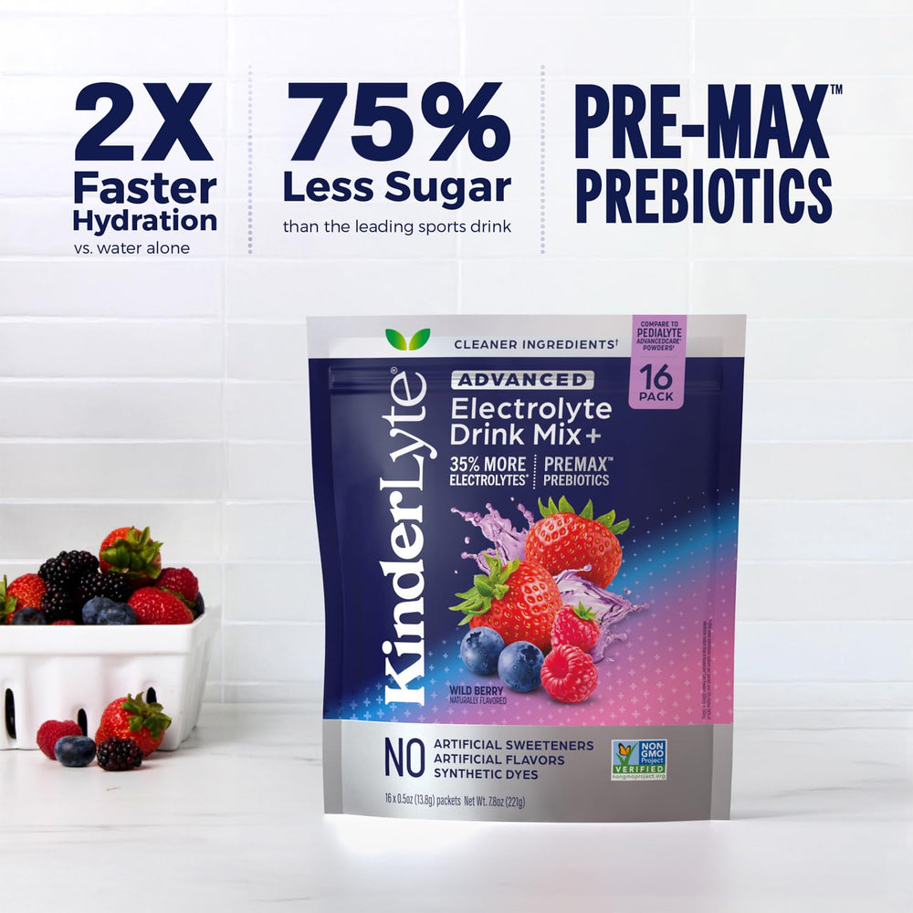 KinderLyte powder being stirred into a 16 oz glass of water.