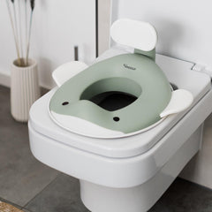 Kindsgut potty seat universal fit for standard toilets with splash protection.