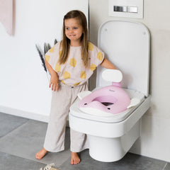 Kindsgut whale pink side view shows compact footprint for shared bathrooms