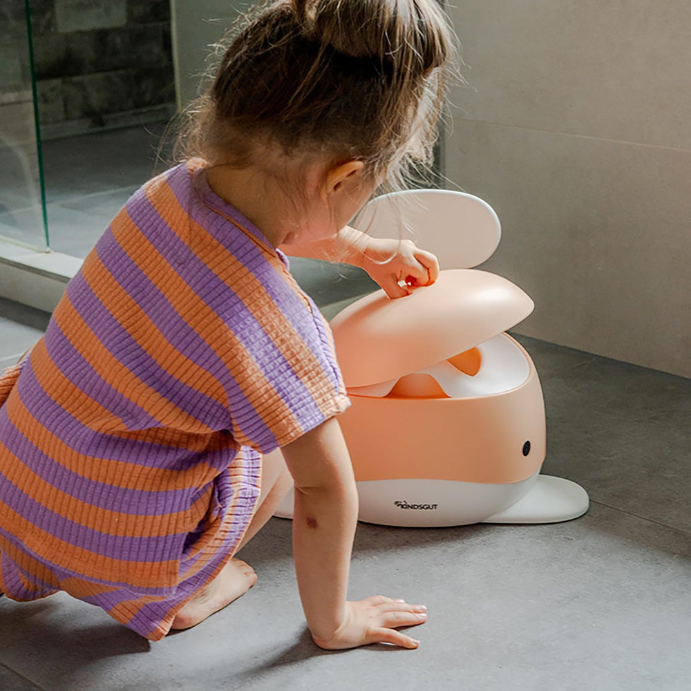 Kindsgut potty training toilet whale peach child-using shows easy-clean use for parents.