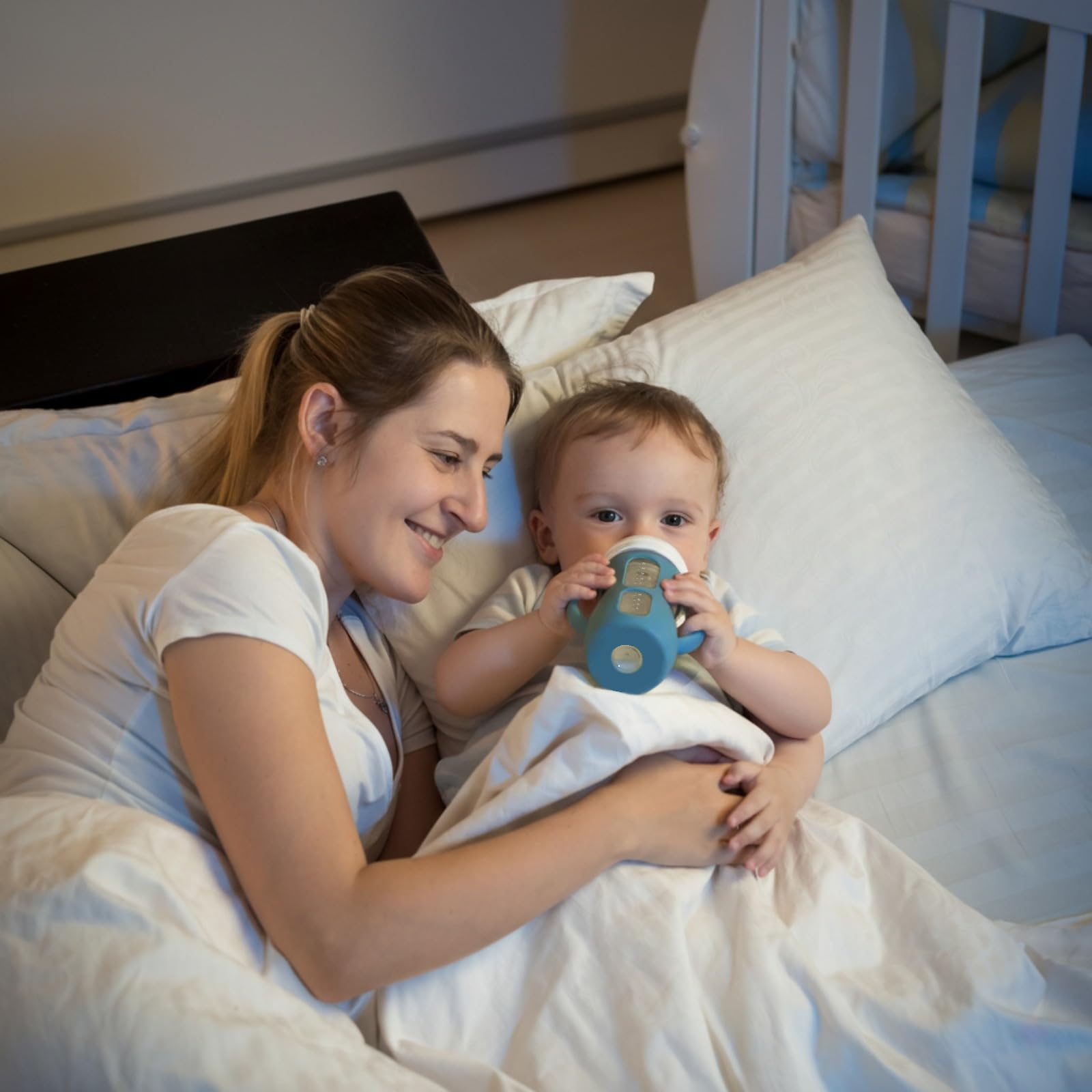 Kingwi silicone sleeve on Avent 8oz bottle in white for secure grip