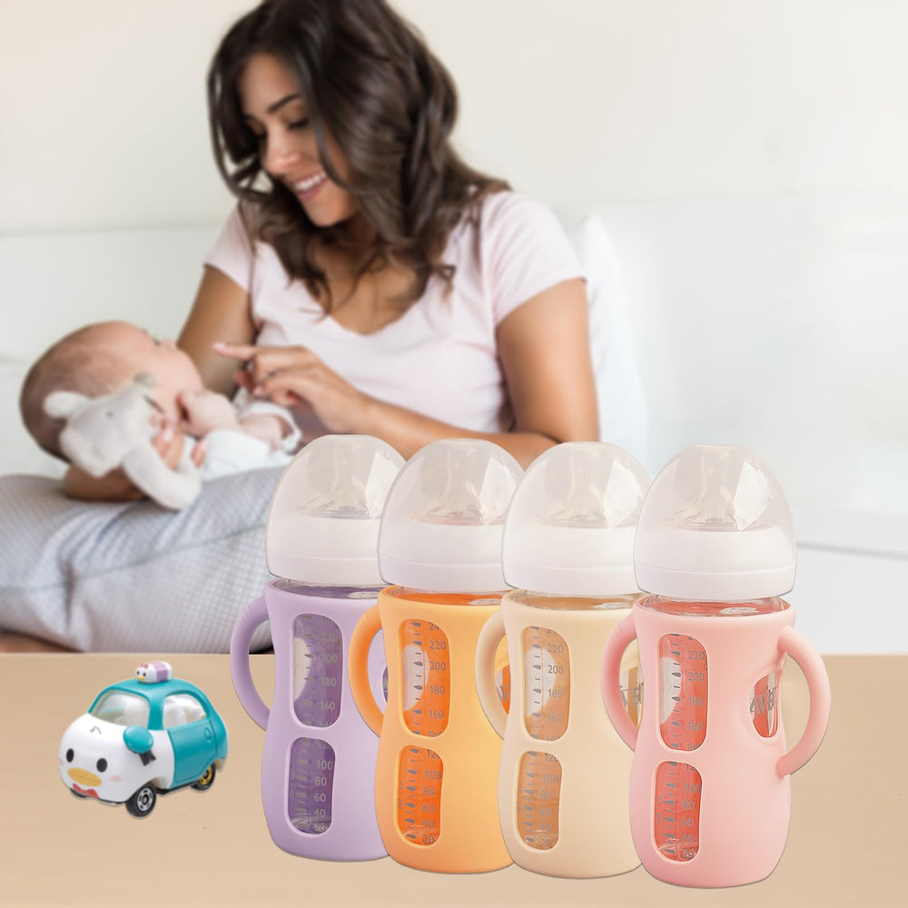 Kingwi silicone sleeve orange for 8oz Avent bottle cushions impacts during busy nights
