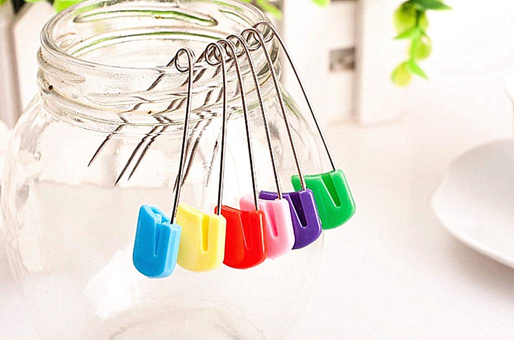 Kinteshun baby clips securing a sleeping bag for cozy bedtime.