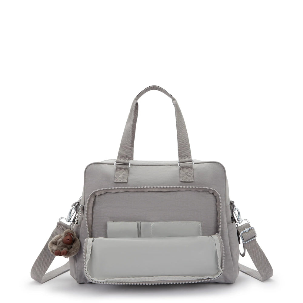 Kipling Alanna includes changing pad for on-the-go diaper changes.