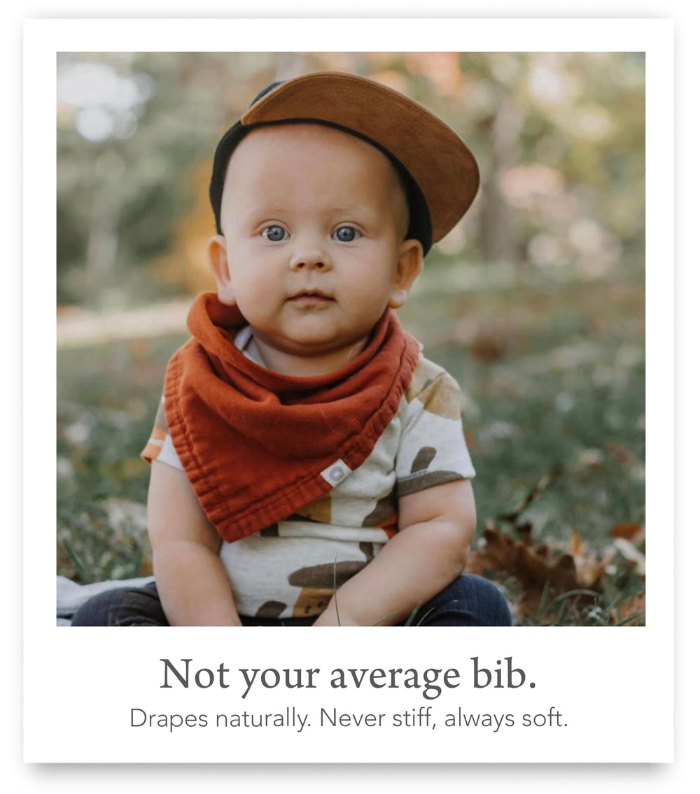 Kishu Baby Indi bandana bib in use during teething mess, easy wipe.