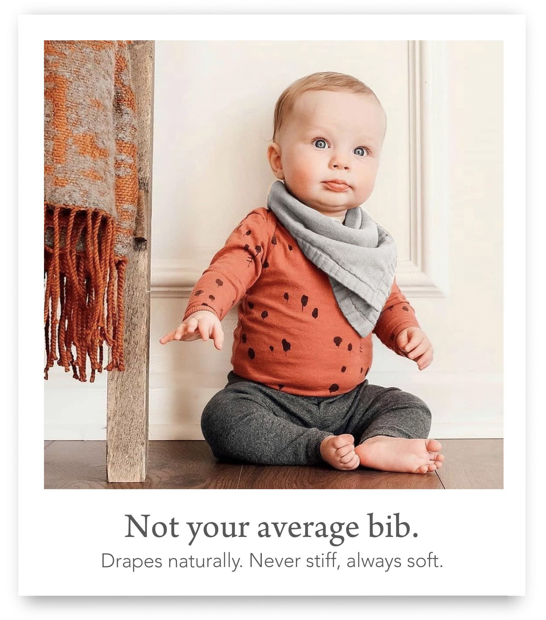 Kishu Baby Indi muslin-texture bib close-up reveals soft, breathable fabric.