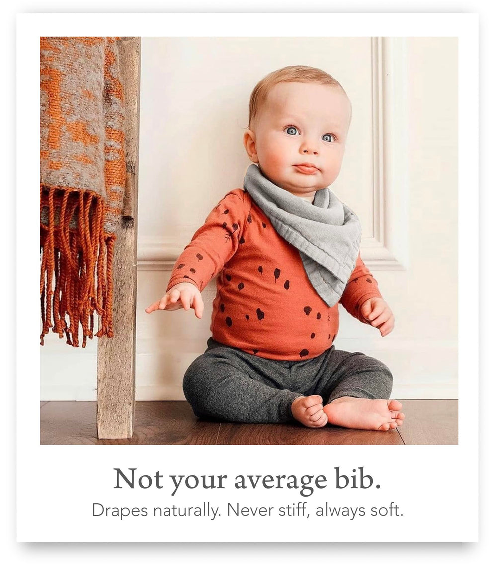 Kishu Baby Indi muslin-texture bib close-up reveals soft, breathable fabric.
