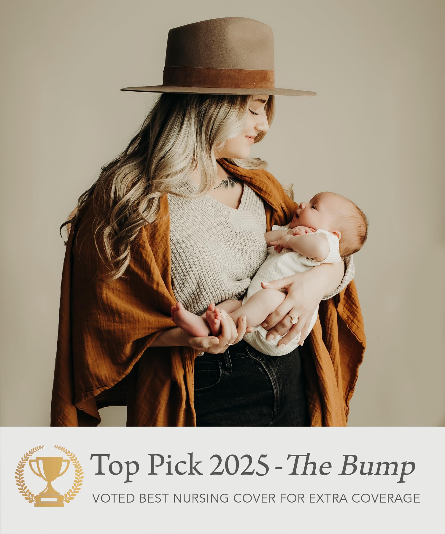 Kishu Baby Indi caramel beach wrap setting demonstrates multi-use coverage