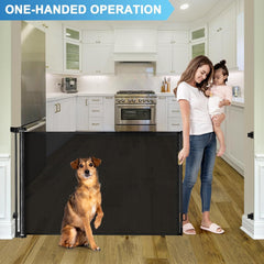 KISKIZ outdoor retractable gate on a deck, keeping pets contained.