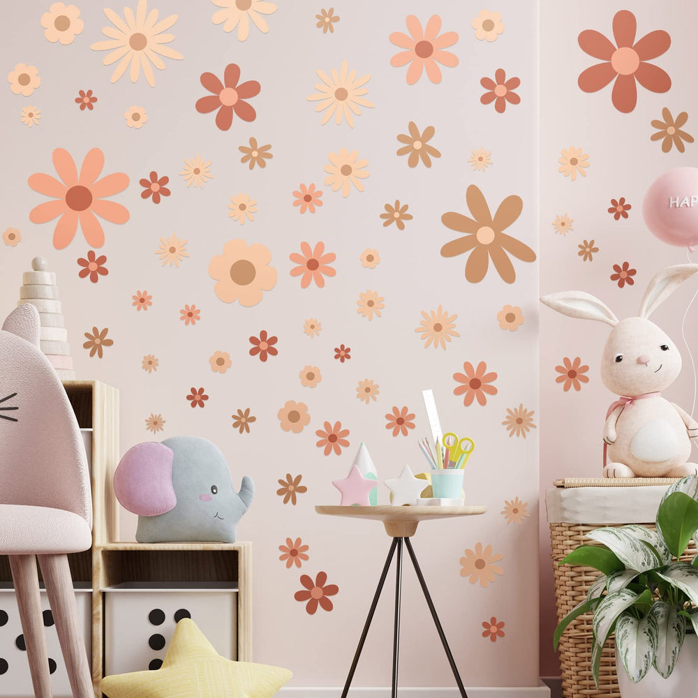Kisston daisy pattern wall decal detail on desks and doors.