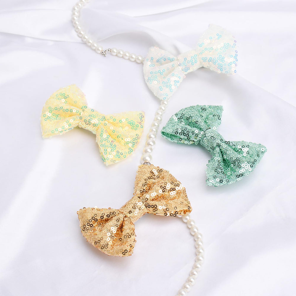 Kiszu green sequin bow clip pairs with party dresses.