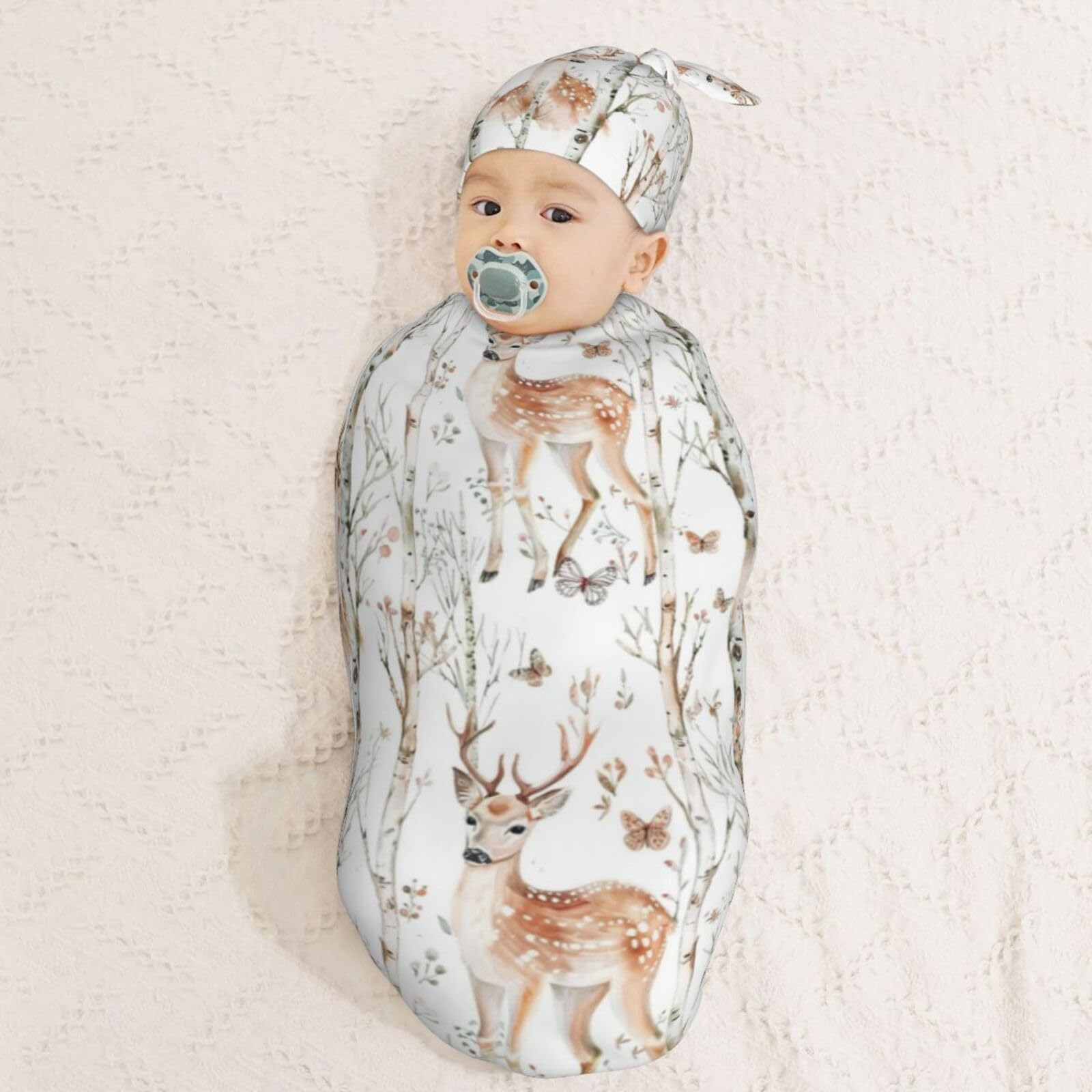 Kiuloam swaddle set with beanie demonstrates adjustable knot for secure, comfortable wear.