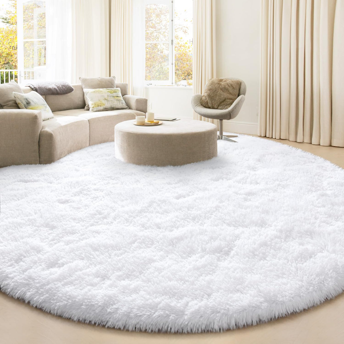 KIXINWA round rug in white offers soft underfoot comfort for bedrooms.