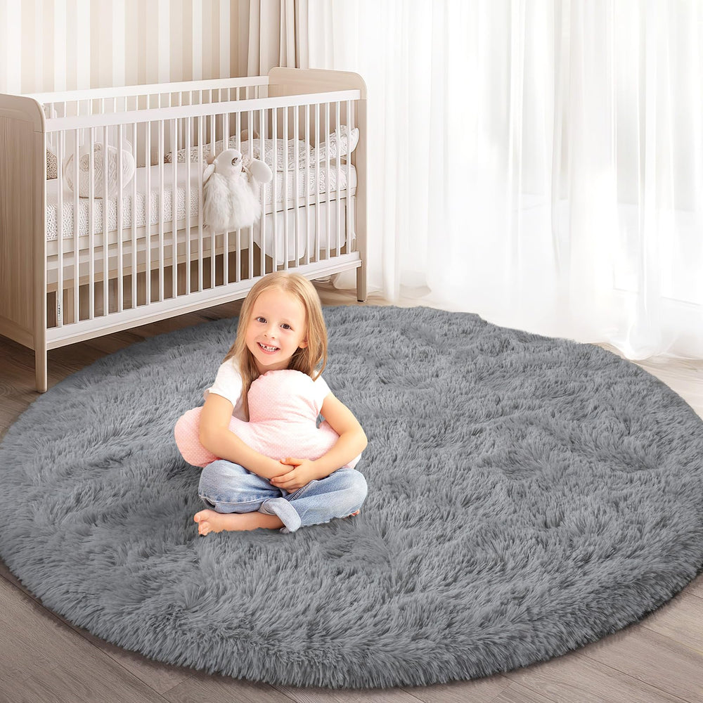 KIXINWA round rug with a soft hexagonal pattern adds cozy warmth to bedrooms.