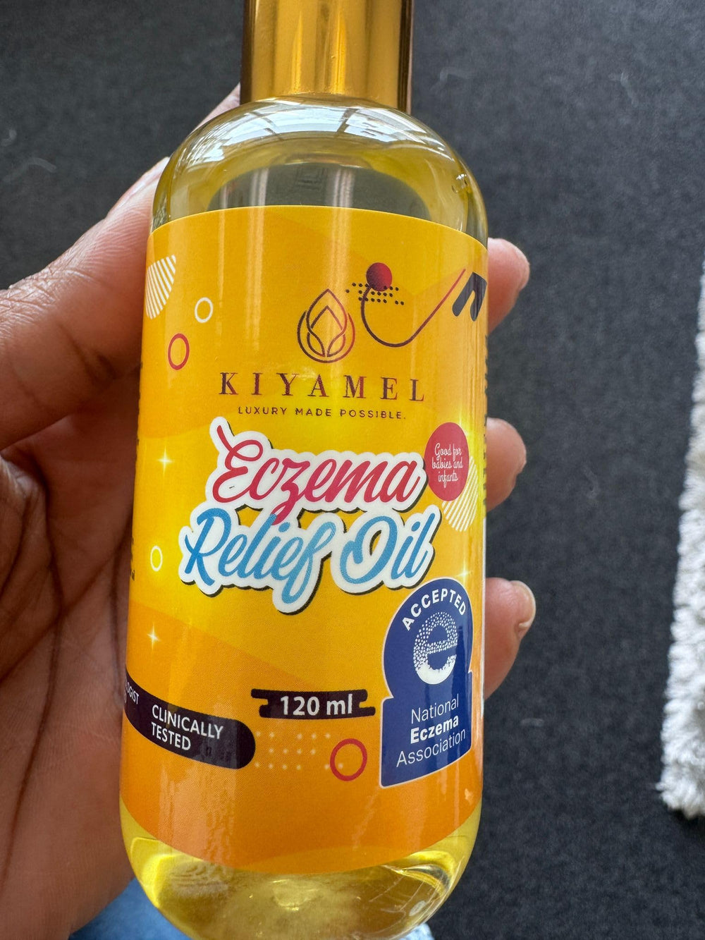 KIYAMEL Baby Oil application shows quick-absorbing moisture for soft, comfortable skin.