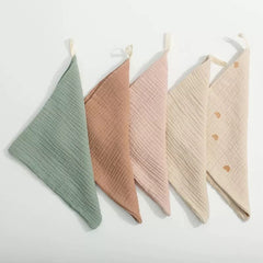 Kjuti burp cloths during feeding demonstrate quick-dry performance after washing.