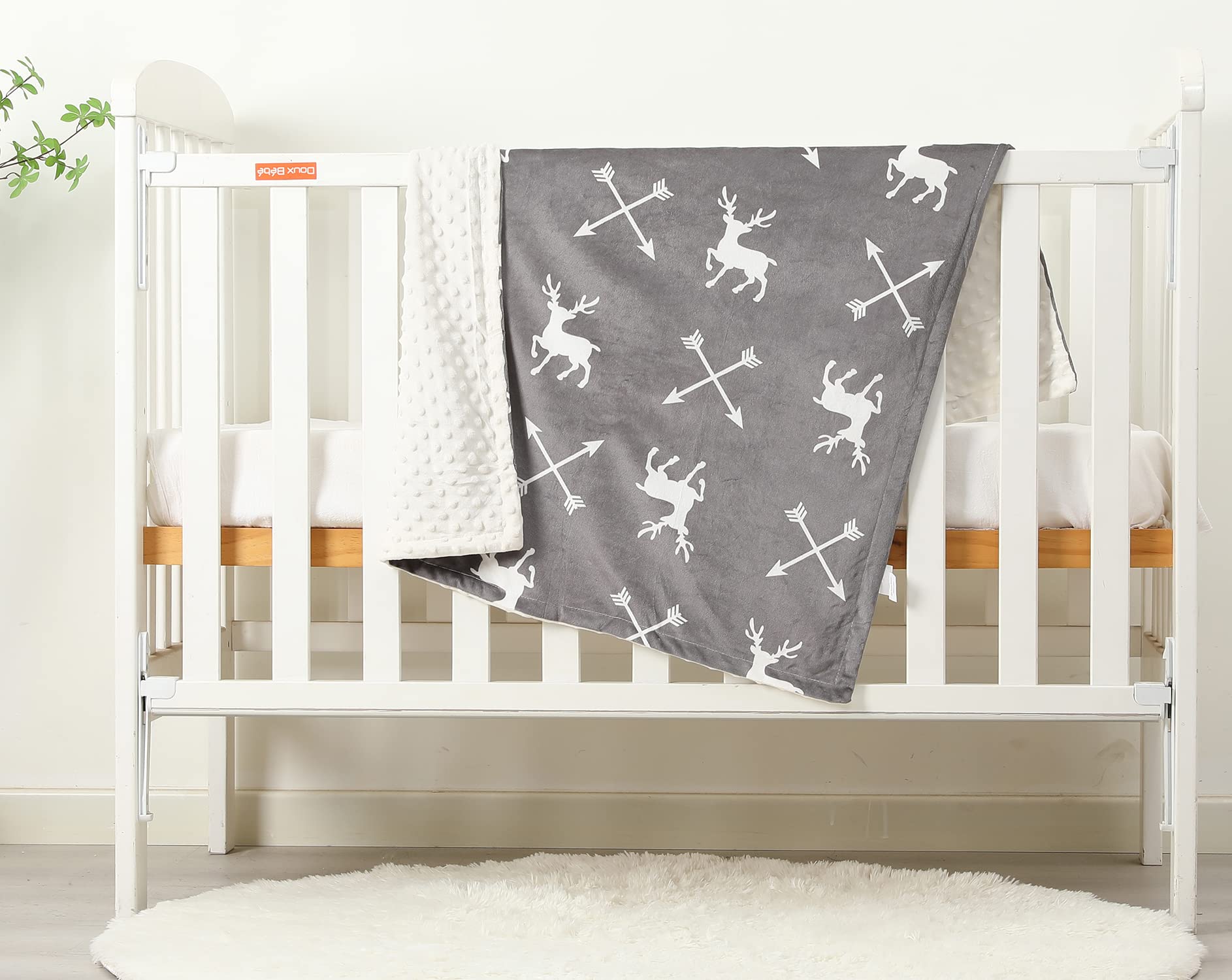 Kleitung Soft Plush Deer Blanket on crib displaying 30x40 size