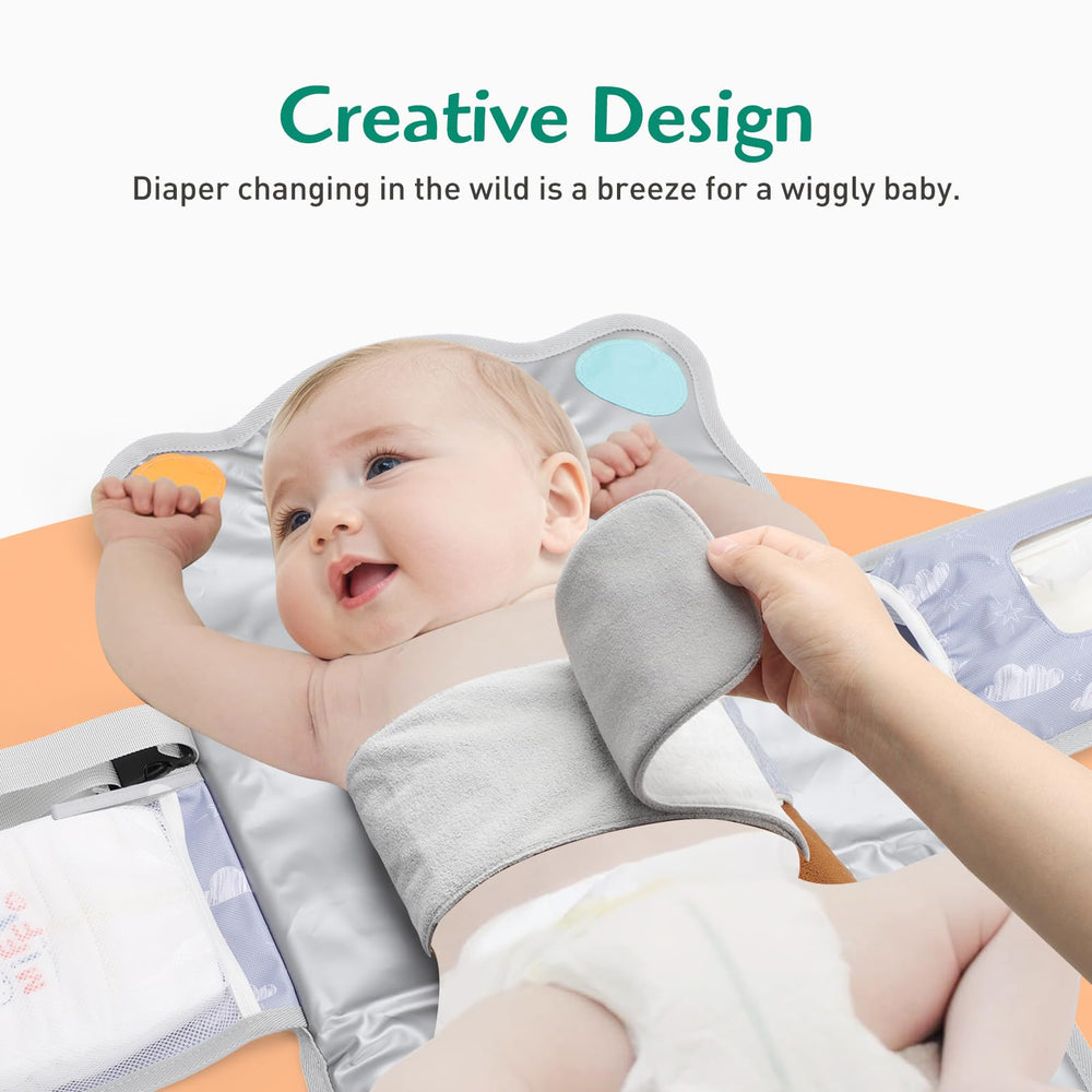 Knirose anti-roll diaper changing pad swaddle wings cocoon-like soothing during changes.