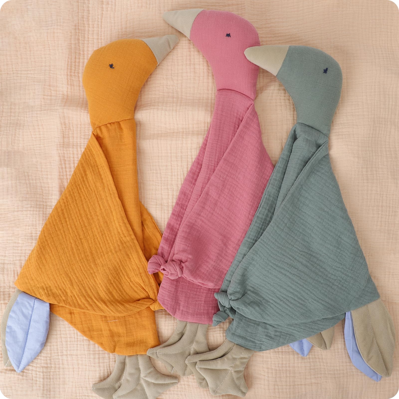 Knirose goose lovey with multi-fabric textures for development.
