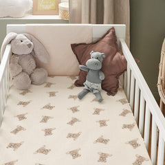 Knirose muslin crib sheet features breathable fabric for warm nights.
