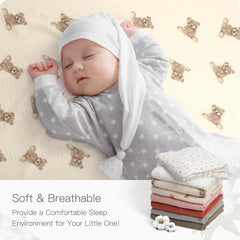 Knirose muslin crib sheet with neutral prints enhances nursery decor.