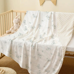 Knirose plush dotted fleece back closeup, cozy warmth for calm naps.