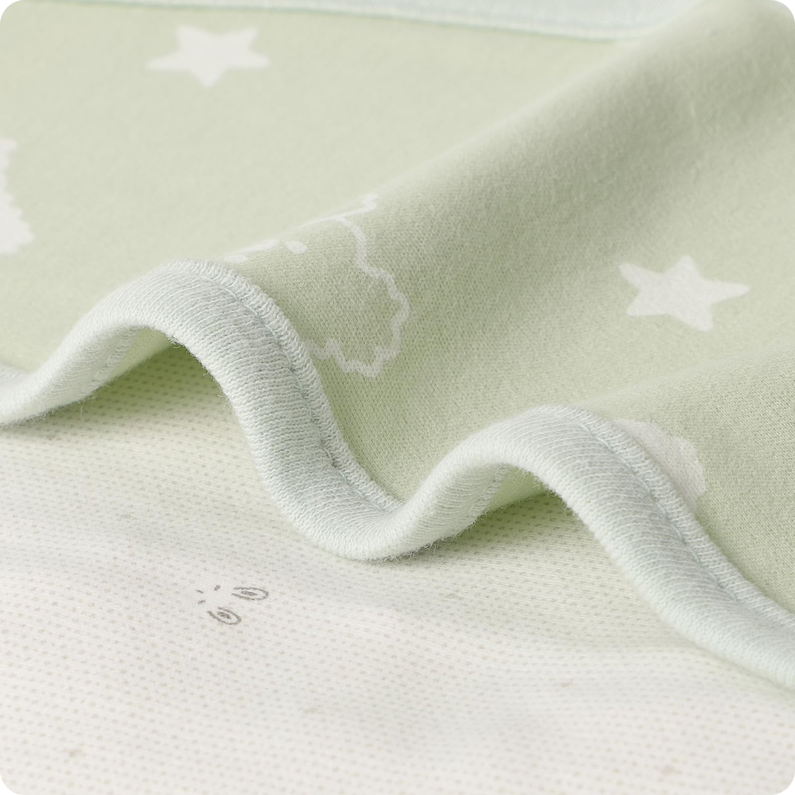 Knirose Snuggle Strap in use aids transition while keeping baby safely wrapped.