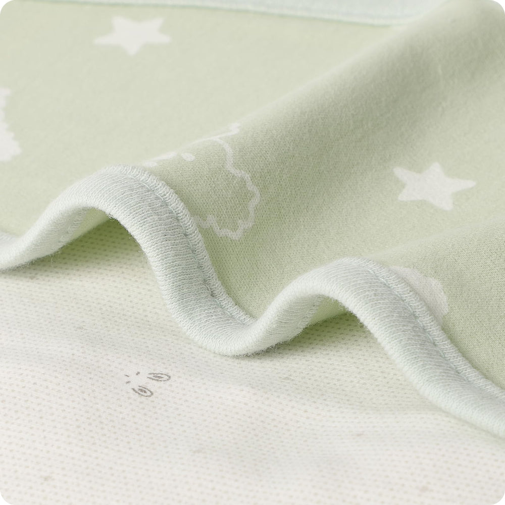 Knirose Snuggle Strap in use aids transition while keeping baby safely wrapped.