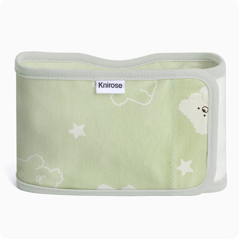 Knirose Snuggle Strap wrapped around swaddle for secure, calming sleep.