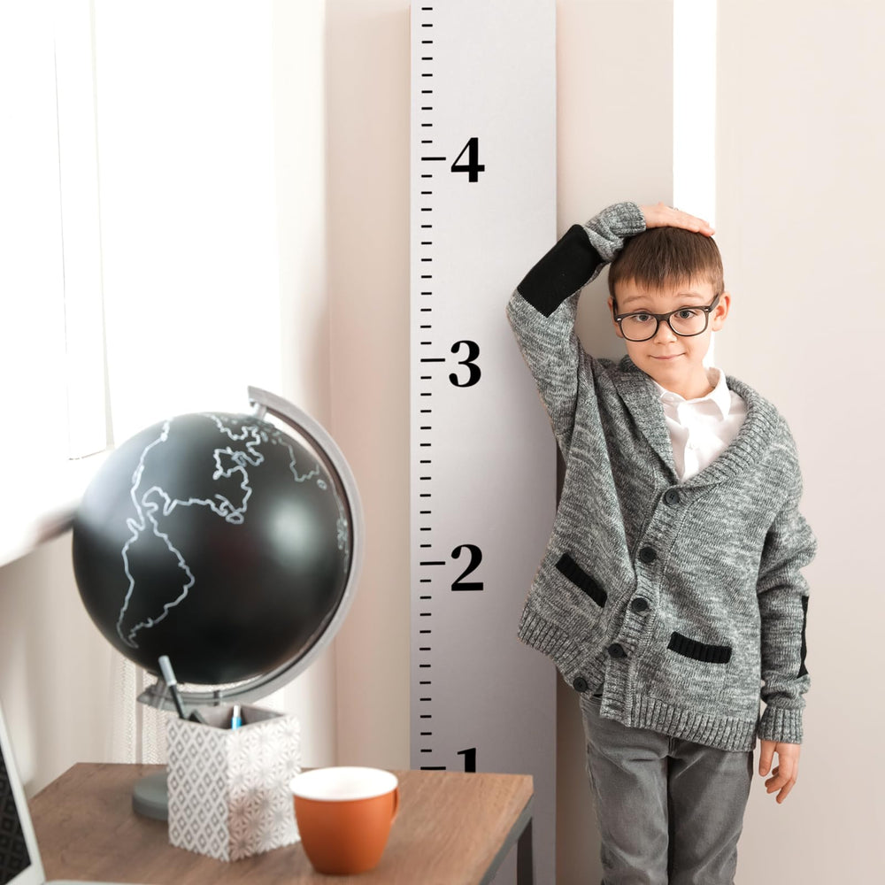 Knitgrip nursery decor growth chart blends with natural tones for cozy rooms.