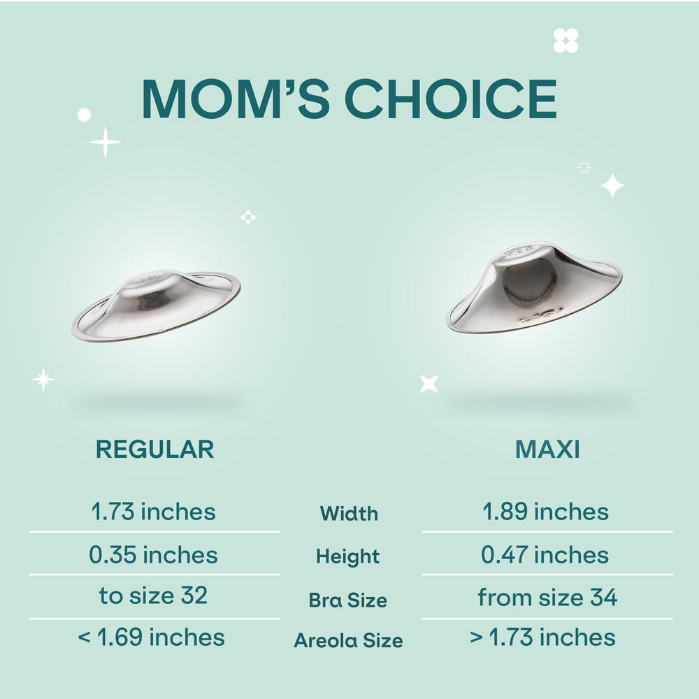 Koala Babycare silver nursing cups with breast milk for gentle adhesion.