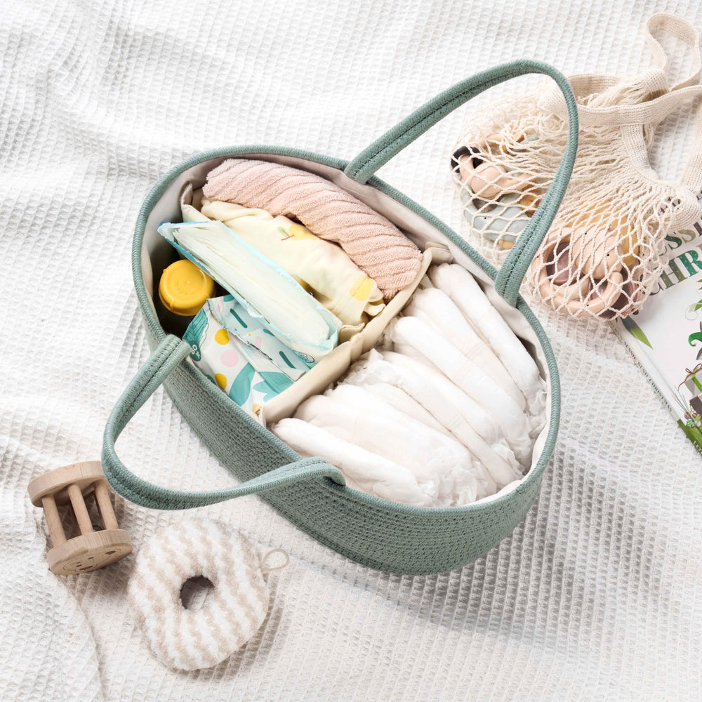 Kodomoore diaper caddy handles close-up for portable, room-to-room organization.