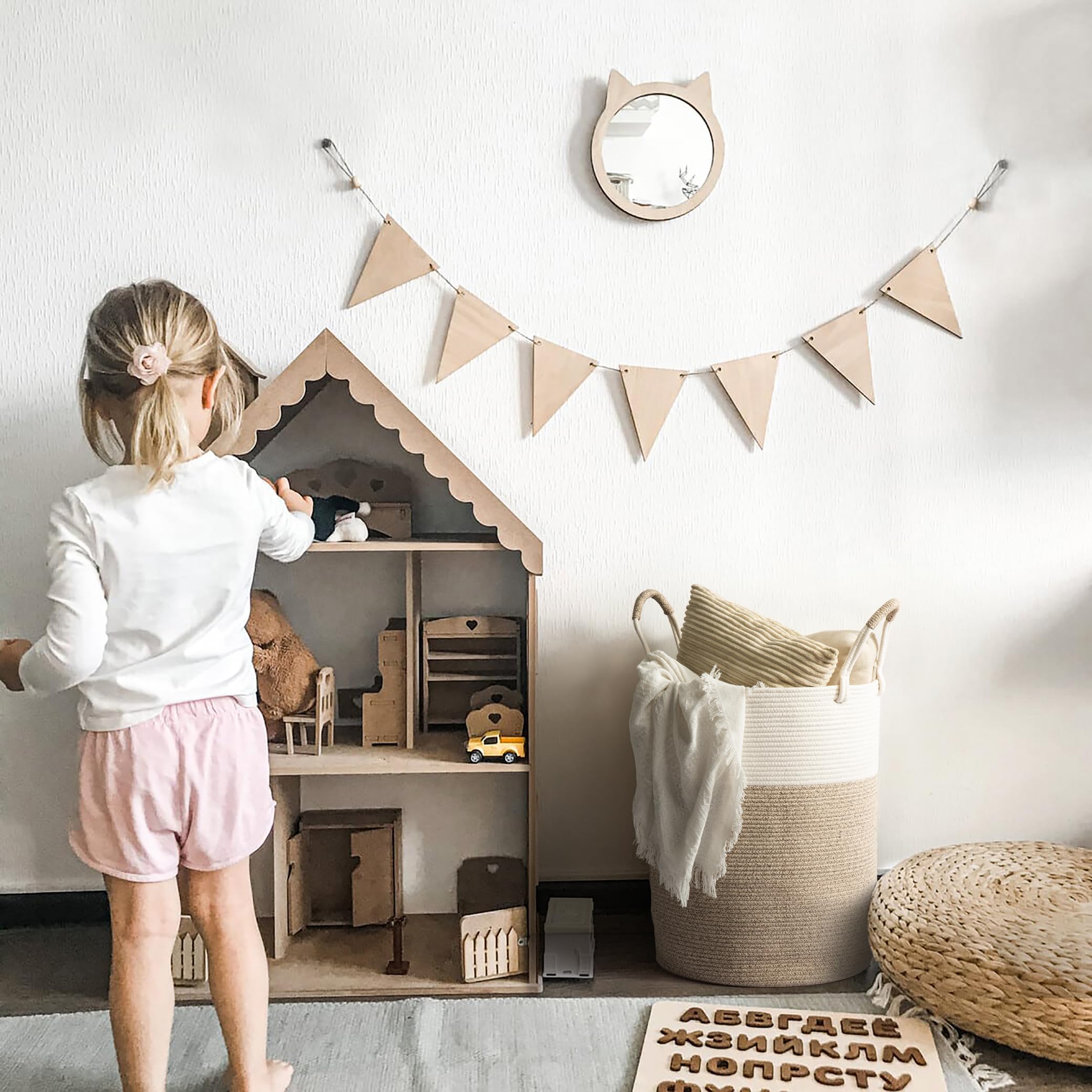 Kodomoore laundry basket in living room setting adds organized Boho style.