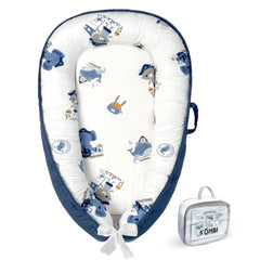 Kombi Baby Lounger Nest blue overview showing cozy design for supervised tummy time and rest.