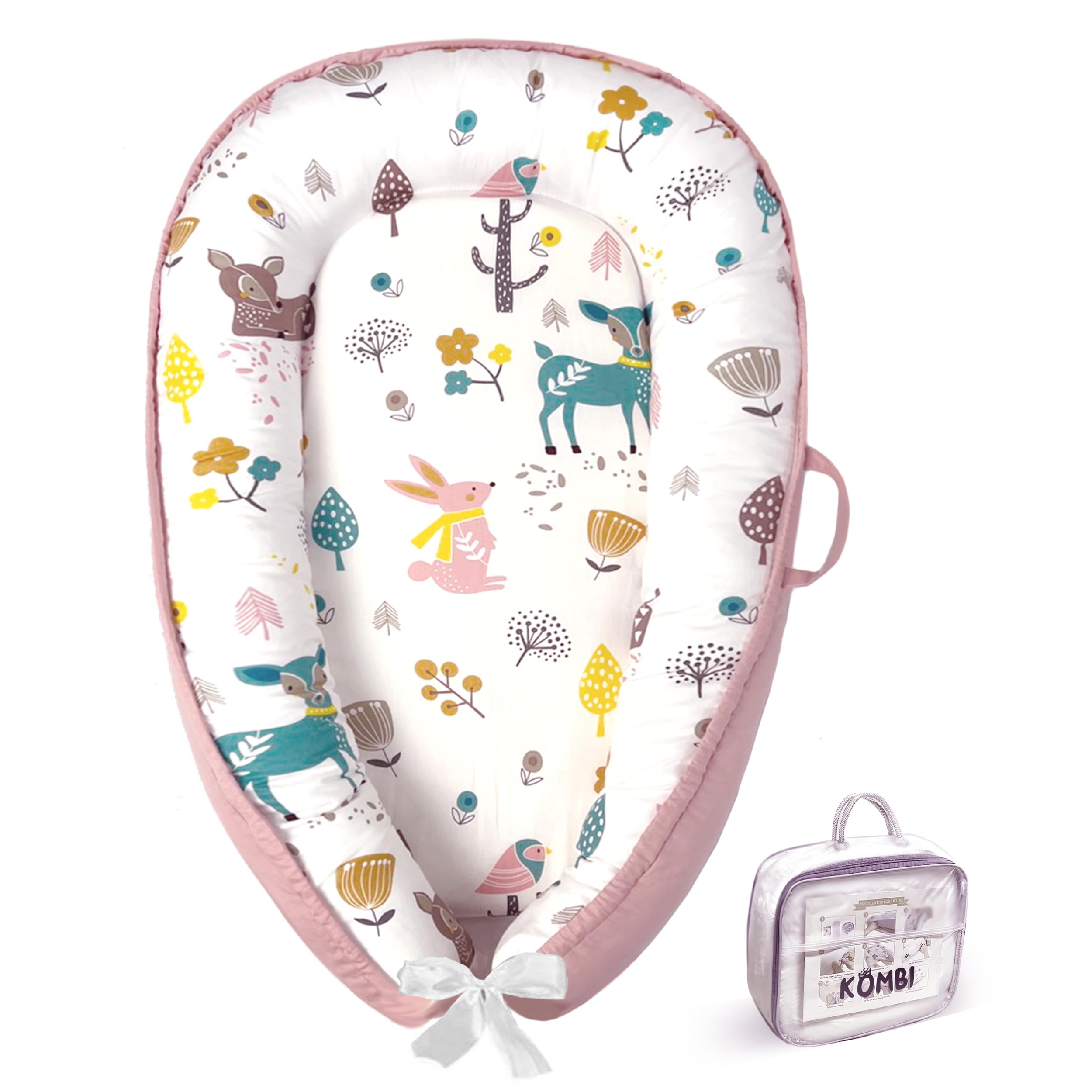 Kombi Baby Lounger Nest pink front view showing cozy newborn support and surround bumpers.
