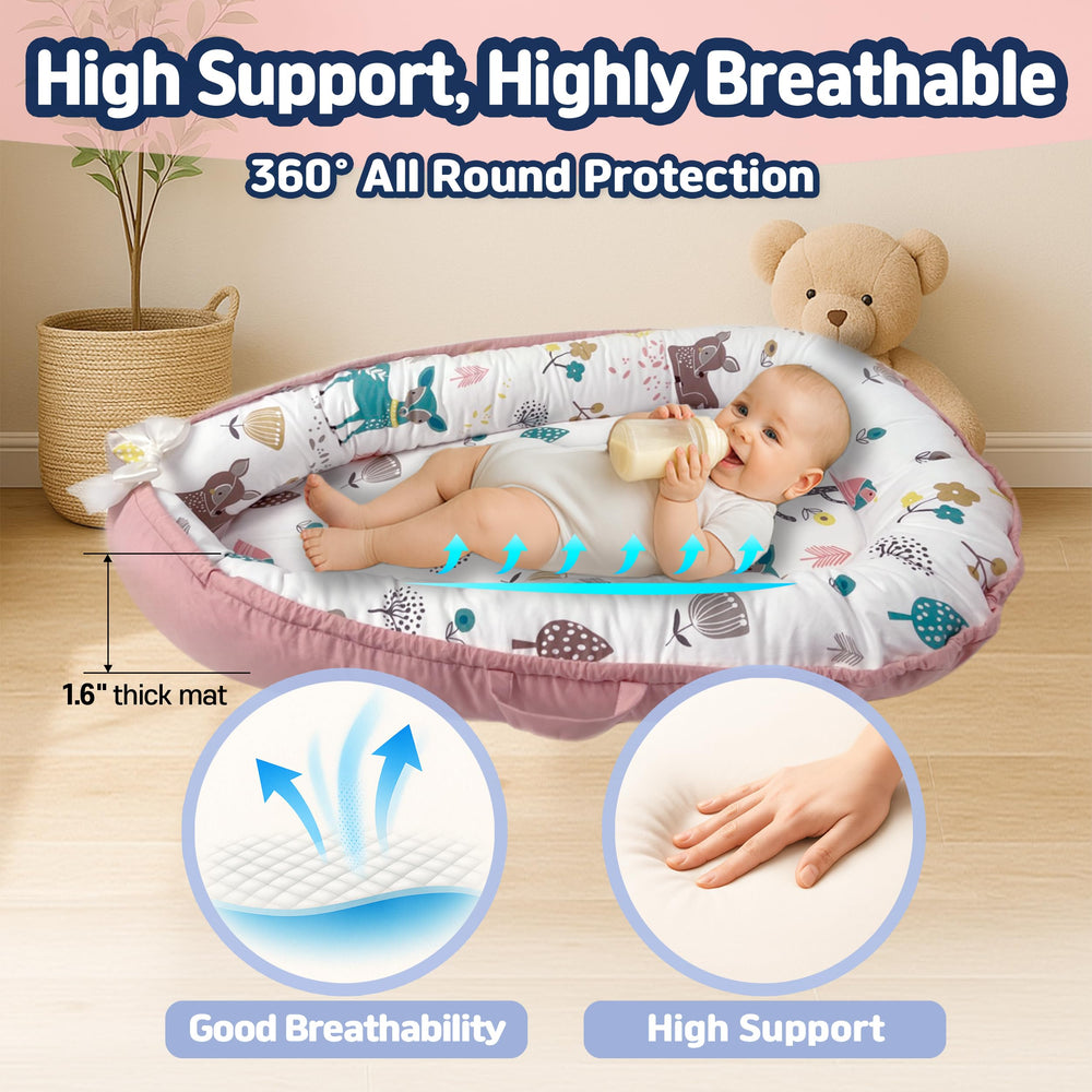 Kombi Baby Lounger Nest portable with carry handles ready for home or travel.