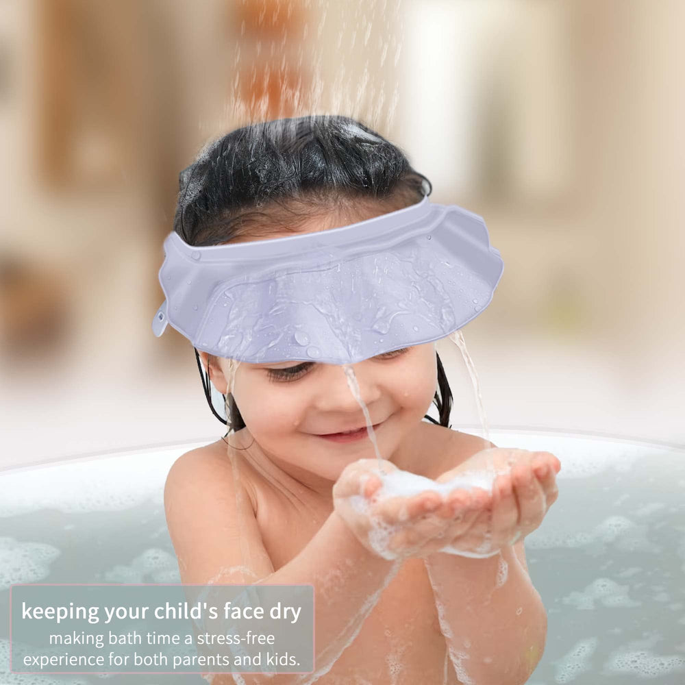KOMIDK baby shower cap blue is ideal for at-home haircuts during bath time.