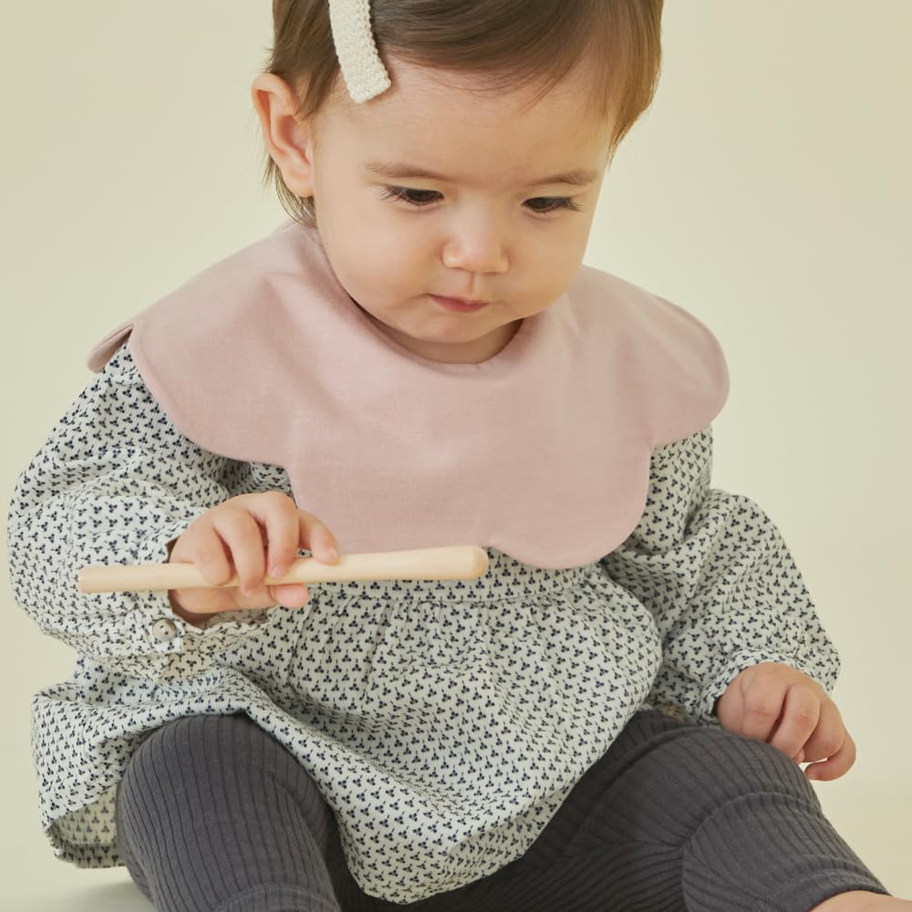 Konny Baby Bib safety certification seal confirms baby textile standards.