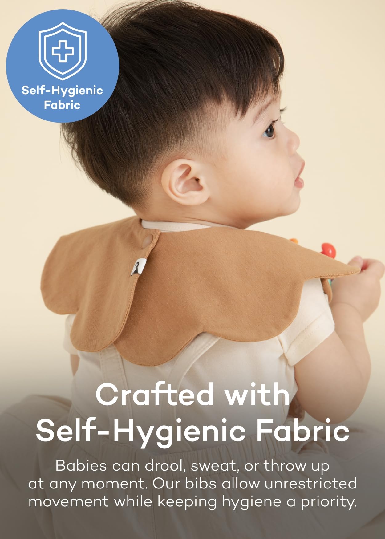 Konny Baby Bibs brown check pattern close-up illustrates durable washable design for messy meals.