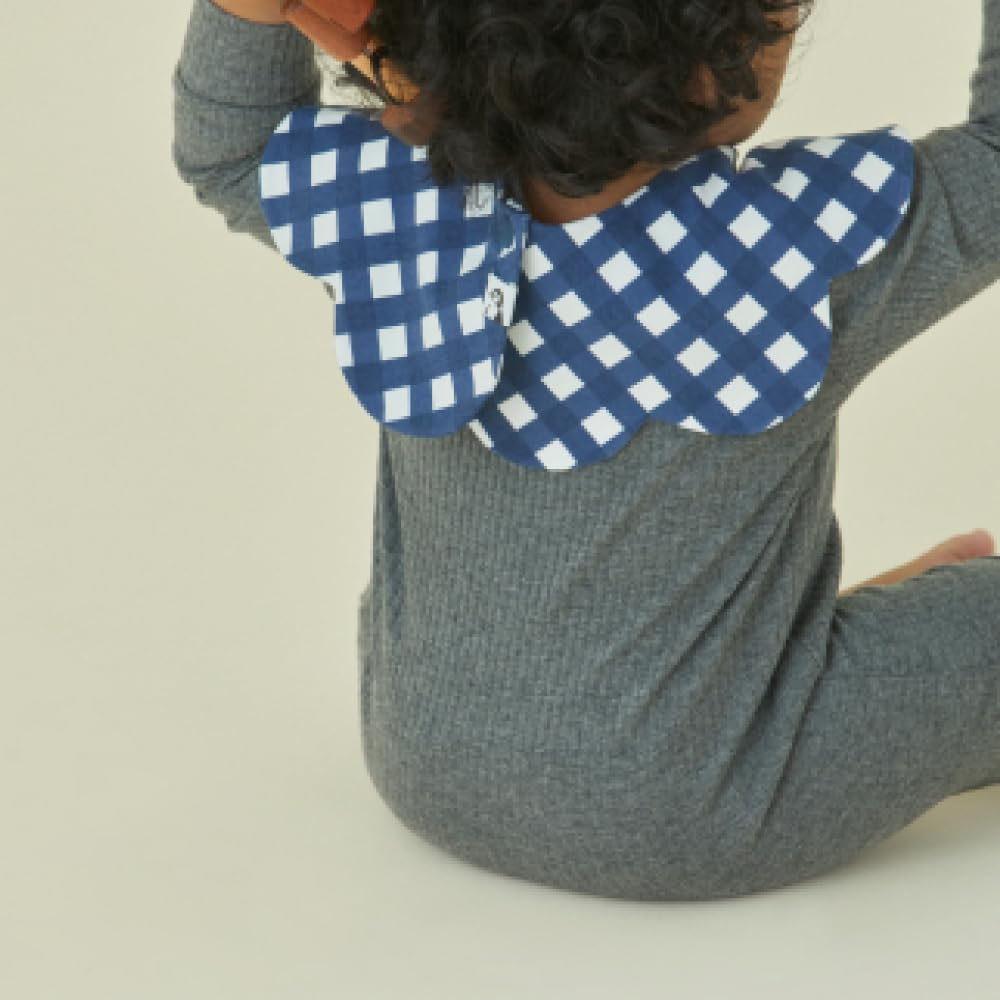 Konny baby bibs displaying three snap positions for different looks