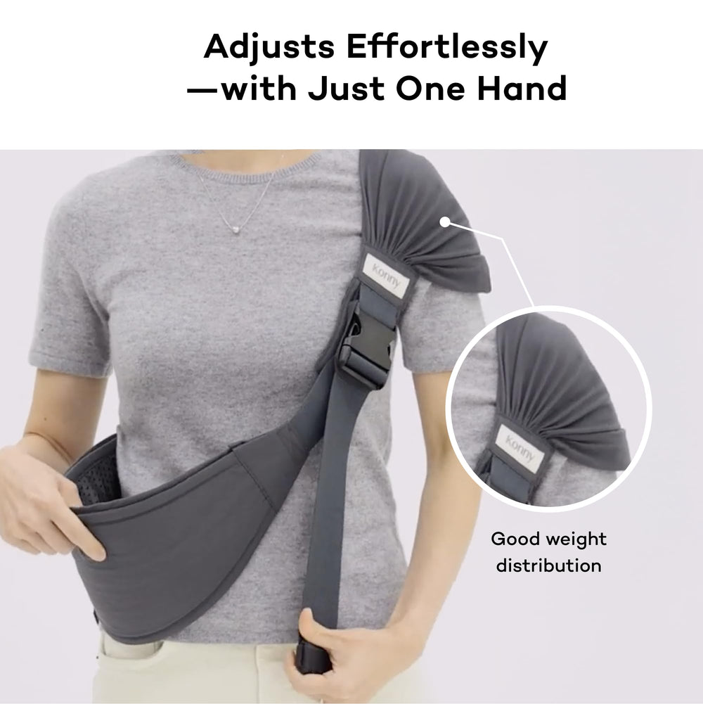 Konny green tea carrier captures baby in sitting position for exploration