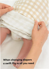 Konny Newborn Swaddle Sage Gingham offers stylish nursery wear with cozy coverage.