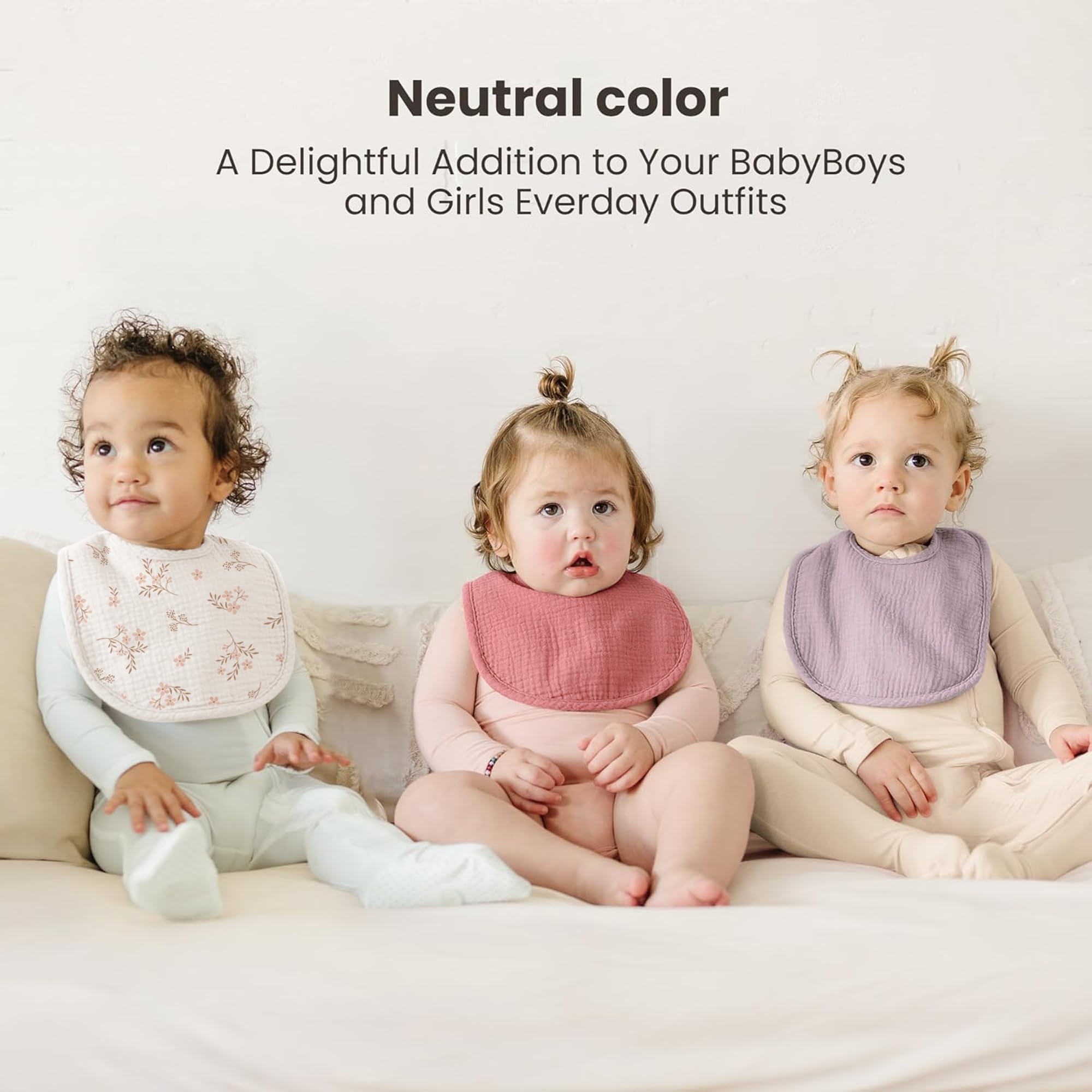 Konssy adjustable snaps on bibs for a secure, growing fit.