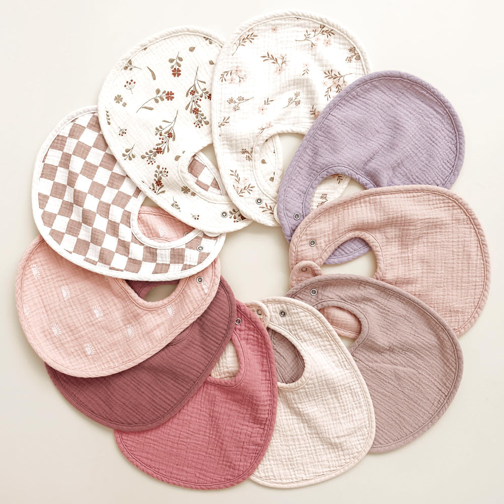 Konssy bibs double as burp cloths for on-the-go cleanup.
