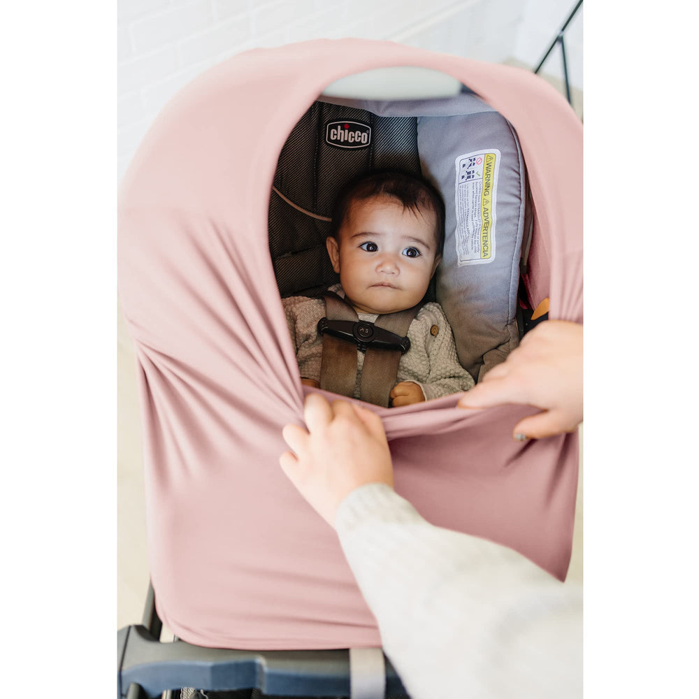 Konssy baby car seat cover in gender-neutral color pairing with any outfit