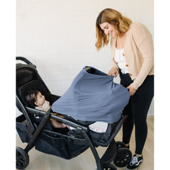 Konssy infant car seat cover acts as stroller sun protection during outings.