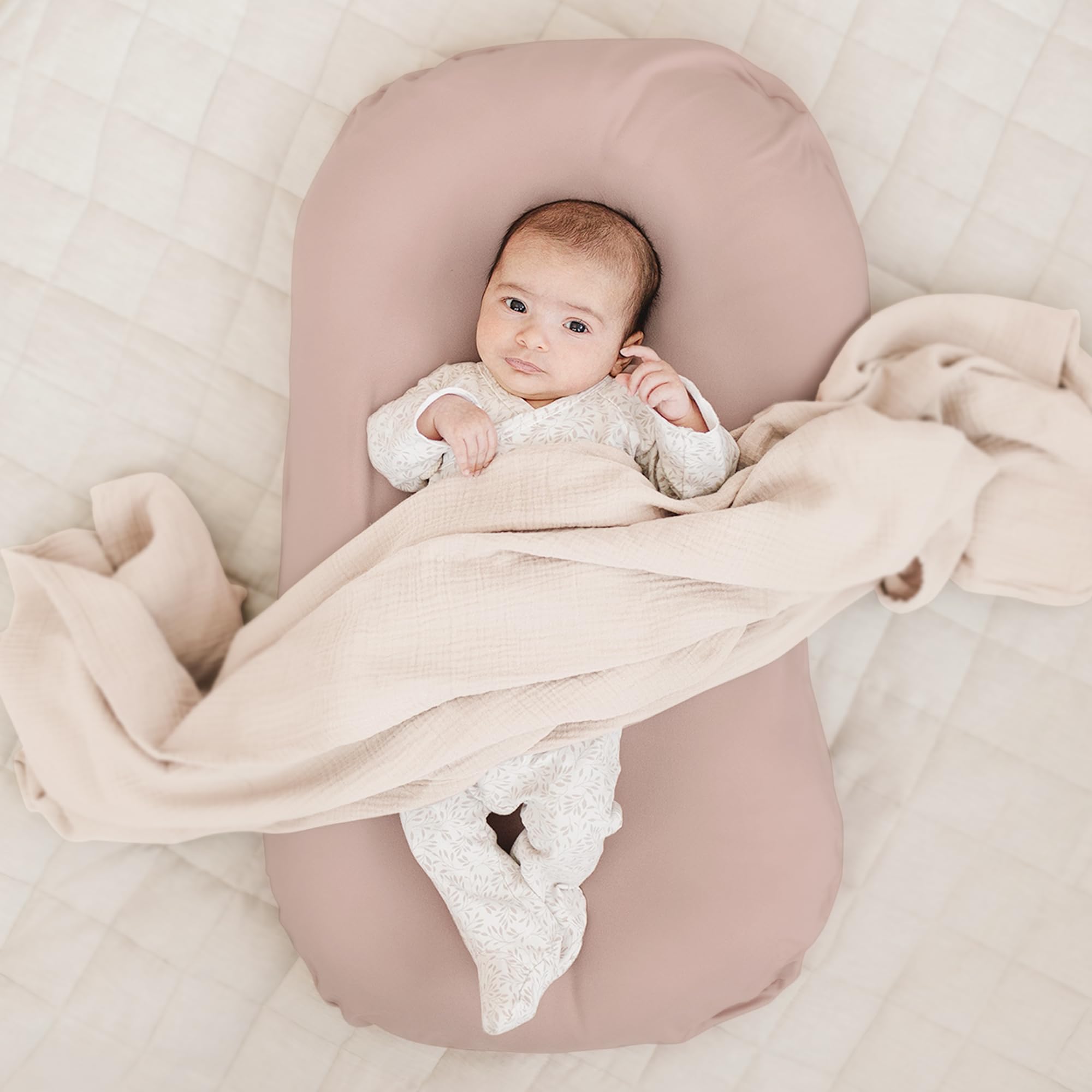 Konssy baby lounger cover stretchy fabric closeup emphasizes breathable, skin-friendly material.