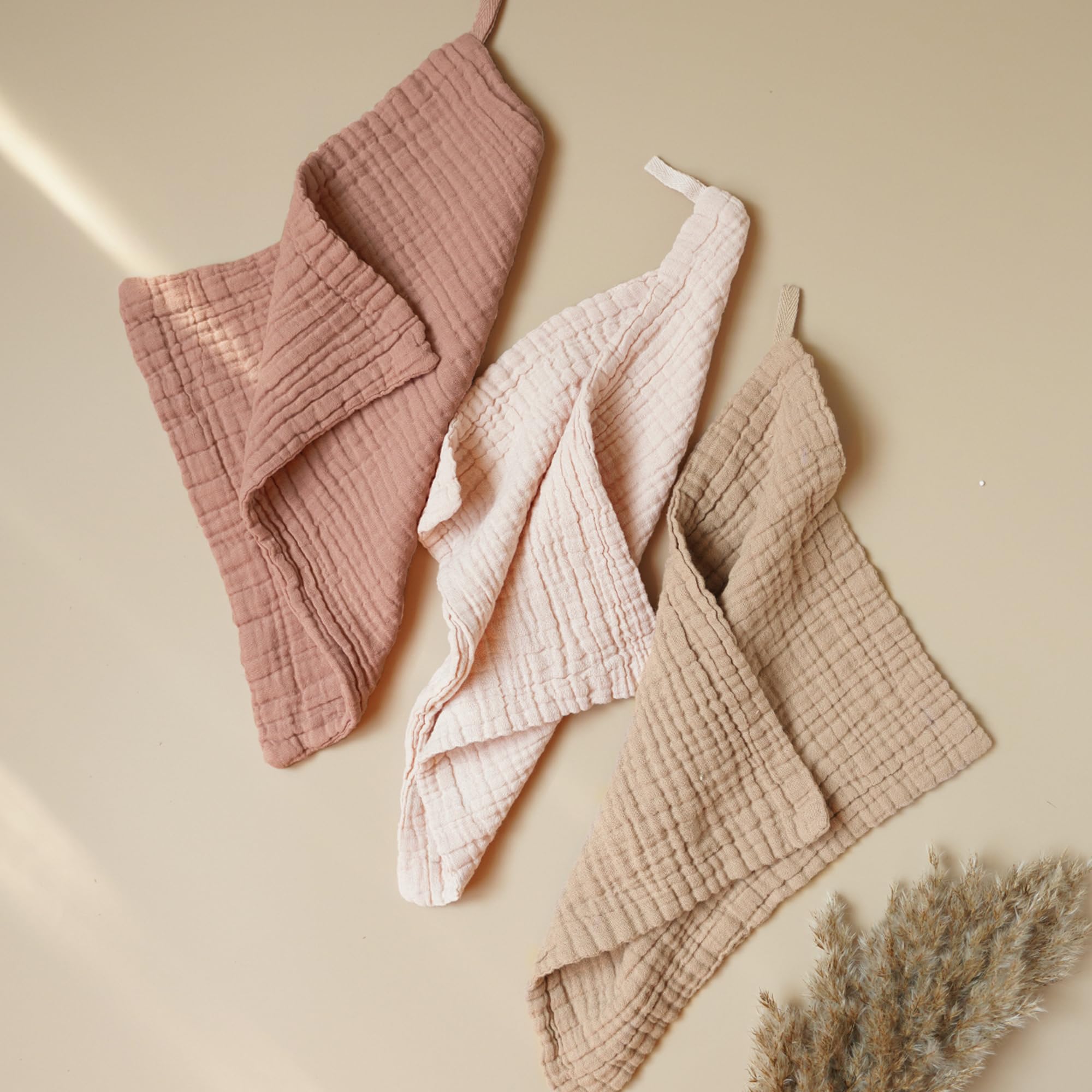 Konssy baby muslin washcloths absorbent texture in action for quick moisture pickup.