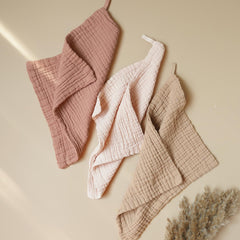 Konssy baby muslin washcloths absorbent texture in action for quick moisture pickup.